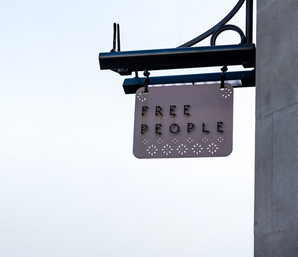 free people, advertising, signage, banner, sign, open, street, road, signpost